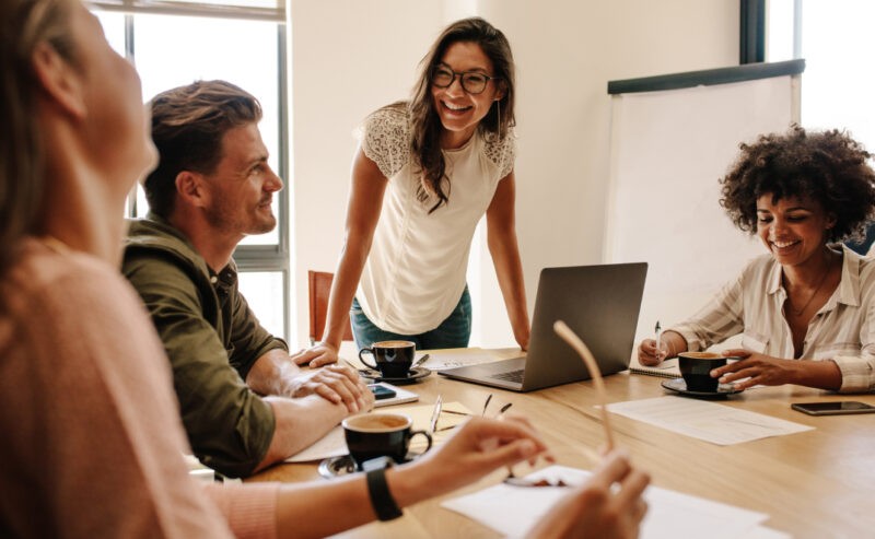 Benefits team working together in meeting