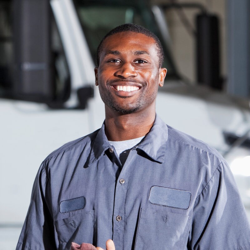 Maintenance Technician smiling at camera