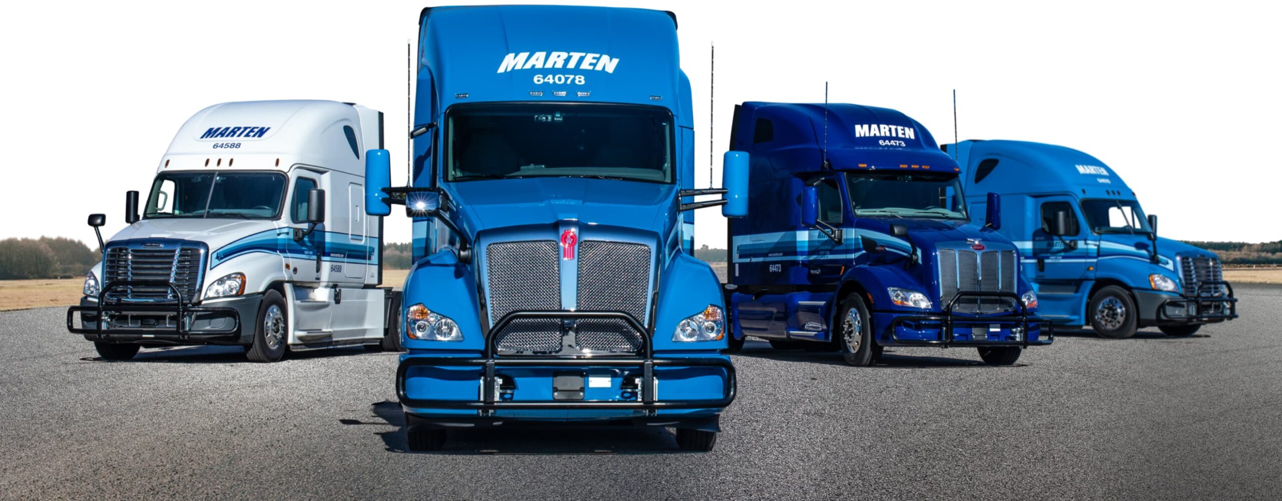 Four Marten trucks facing viewer